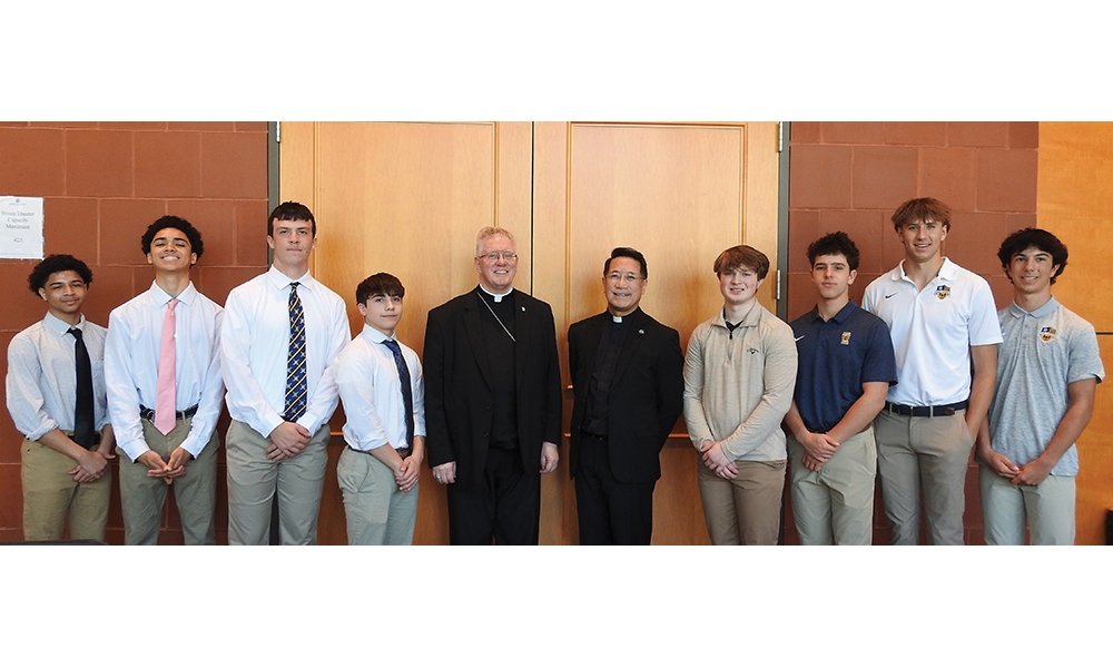 Eight students ‘changed’ during Mass of initiation at Saint Ignatius High School
